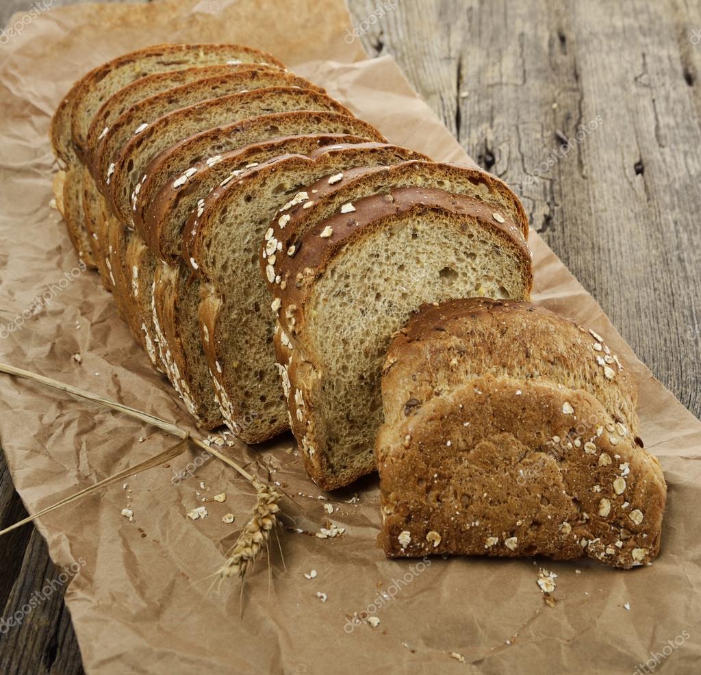 Sliced Brown Wholewheat Bread — Stock Photo © svetas 30689415