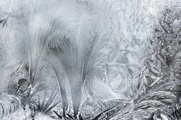 Μοτίβα του πάγου σε ένα παράθυρο χειμώνα — Φωτογραφία Αρχείου