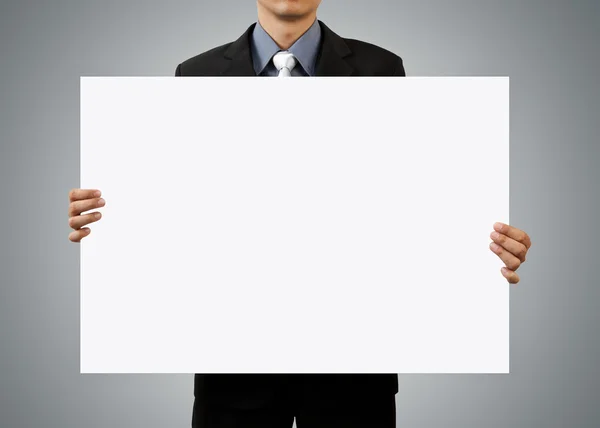 Geschäftsmann mit leerem Schild und weißer Hand — Stockfoto