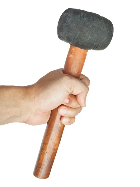 Mão com martelo de borracha velha no fundo branco — Fotografia de Stock