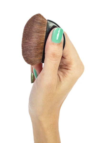 Cosmetic brush and hand — Stock Photo, Image