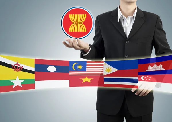 Gospodarczej ASEAN w ręce biznesmen — Zdjęcie stockowe