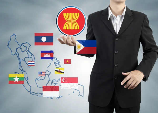 ASEAN Economic Community in businessman hand — Stock Photo, Image