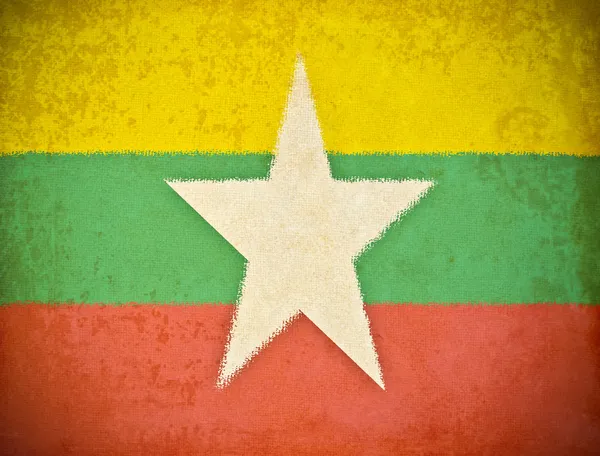 Gamla grunge paper med myanmar flagga bakgrund — Stockfoto