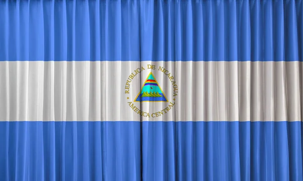 Nicaragua flag on curtain — Stock Photo, Image