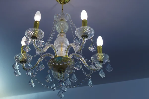 Crystal chandelier on ceiling — Stock Photo, Image