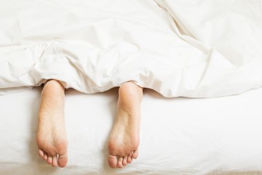 two feet in a bed clipart