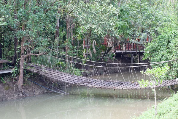 Rope bridge  across river — Stock Photo, Image