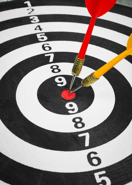 Business competition target concept and darts board — Stock Photo, Image