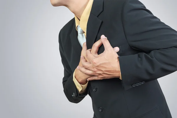 Businessman having heart attack — Stock Photo, Image