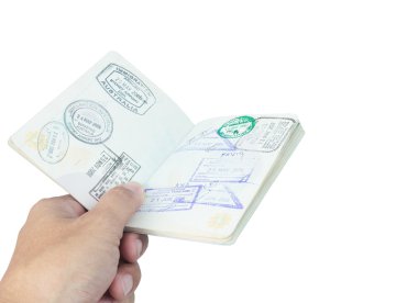 pasaport damgası ve beyaz zemin üzerine el