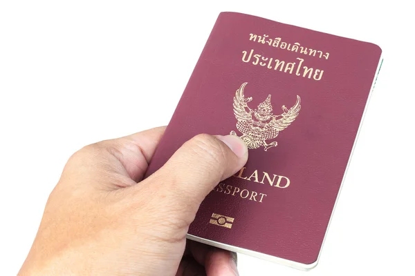 Thailandia Passaporto e mano su sfondo bianco — Foto Stock