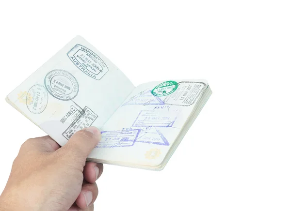 Passeport timbre et main sur fond blanc — Photo