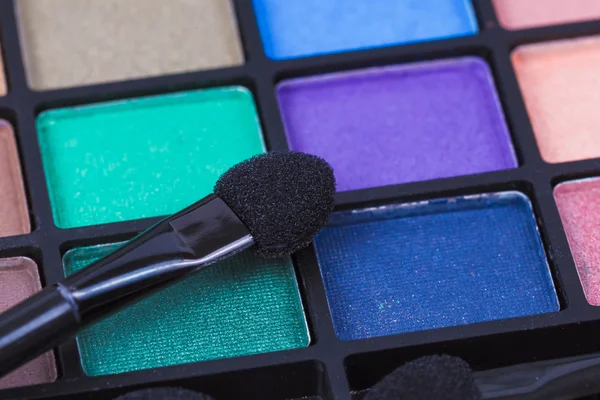 Set cosmético colorido y maquillaje —  Fotos de Stock
