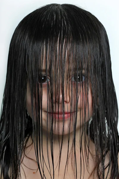 Little girl with wet hair in her face — Stock Photo, Image