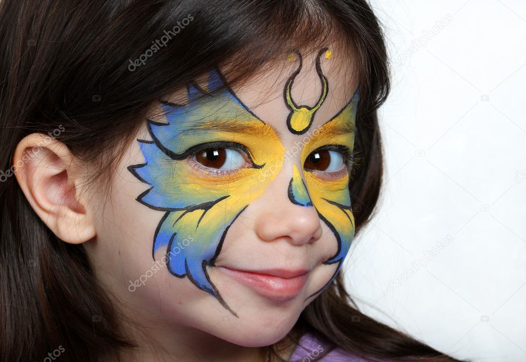Pretty girl with face painting of a butterfly