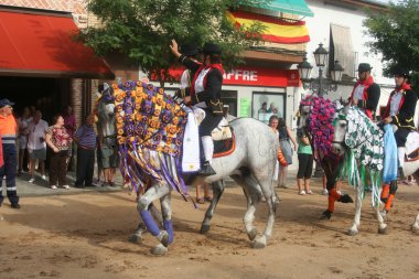Horse racing in Carpio de Tajo, Patron Santiago clipart
