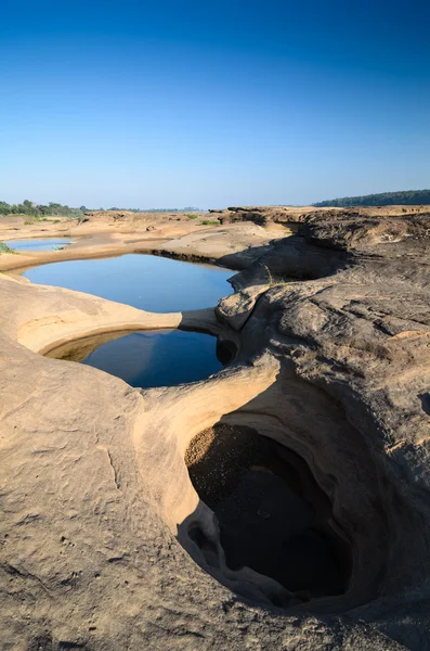 Lagoa em Sampanbok, no rio Mekong — Fotografia de Stock