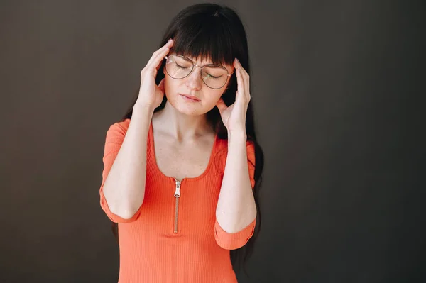 Headache Young Girl Glasses Brunette Bangs Migraine Black Background Copy — Stok fotoğraf