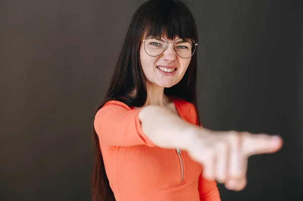 Serious Girl Glasses Shows Thumbs Negative Girl Smiles Gritting Her — Φωτογραφία Αρχείου