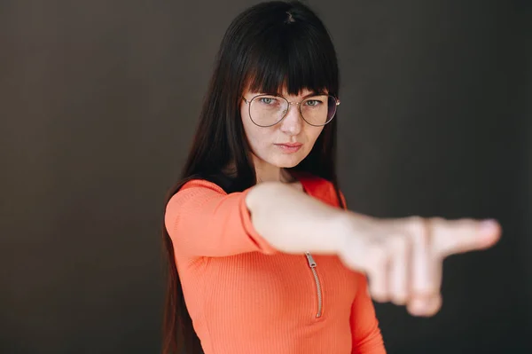 Serious Girl Glasses Shows Thumbs Evil Girl Black Background Away — Stok fotoğraf