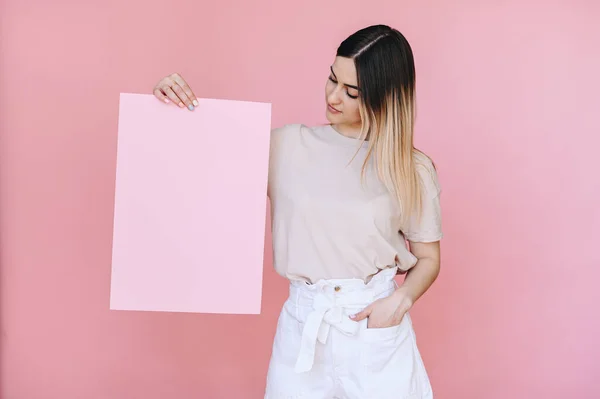 Girl Holds Sheet Pink Paper Her Right Hand Her Right — Photo