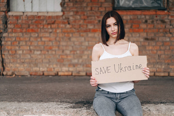 tired, sad Ukrainian calls to stop the war in Ukraine. Genocide of the Ukrainian people. War in the 21st century in Ukraine