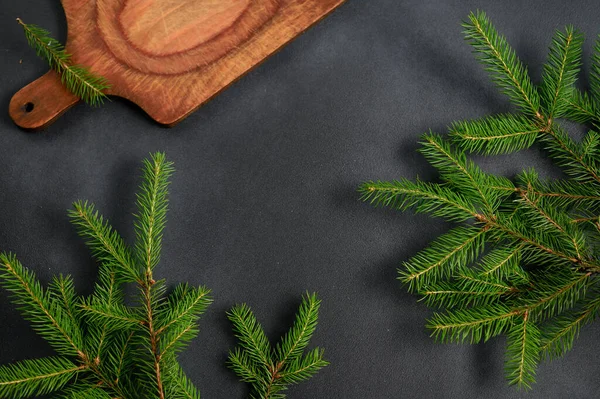 Top View Christmas Mockup Fir Branches Old Wooden Cutting Board — Stock Fotó