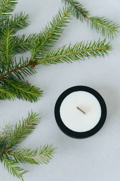 Black Candlestick Soy Wax Candle Green Christmas Tree Branches Close — Photo