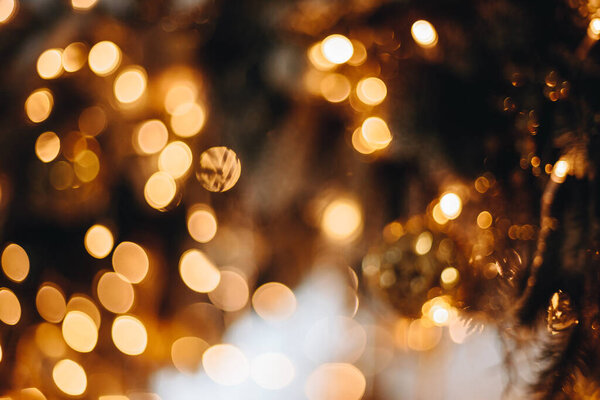 Yellow Abstract Background, Bokeh Lights from Garlands. Christmas Tree. Horizontal Screensaver, Christmas Background.