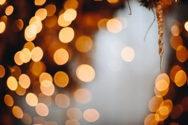 Abstract Orange Circles Bokeh Lemons from Garland. Free Space for Text. Christmas Card.