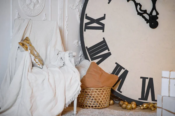 Christmas Interior with Big Clock, Armchair and White Plaid. Interior Photo Studio. Copy Space