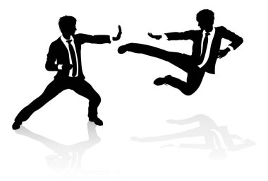 Two business people fighting in martial arts or karate style. Competition concept