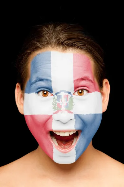 Meisje met Dominicaanse Republiek vlag op haar gezicht — Stockfoto