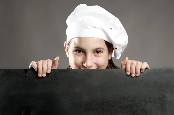 Chef holding chalkboard — Stock Photo, Image