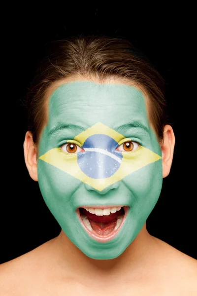 Meisje met de Braziliaanse vlag op haar gezicht — Stockfoto