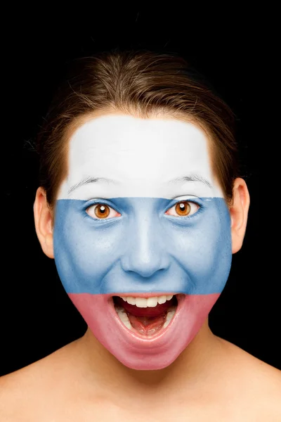 Girl with russian flag painted on her face — Stock Photo, Image