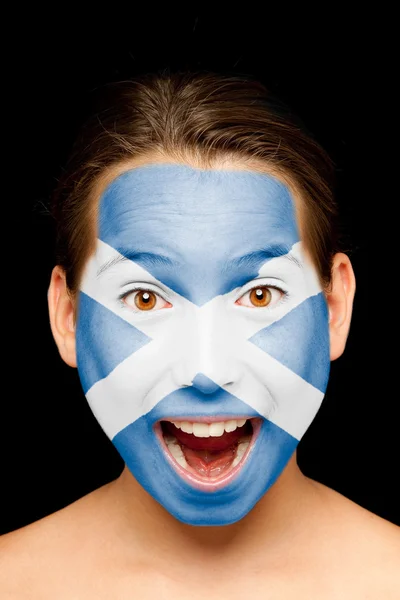 Girl with scottish flag painted on her face — Stock Photo, Image