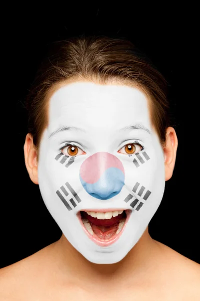 Mädchen mit südkoreanischer Flagge im Gesicht — Stockfoto