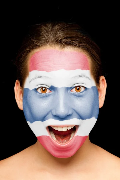 Girl with thai flag painted on her face — Stock Photo, Image
