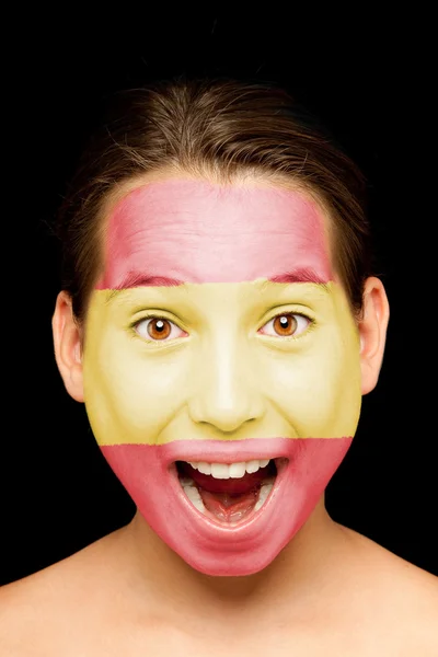 Menina com bandeira espanhola pintada em seu rosto — Fotografia de Stock