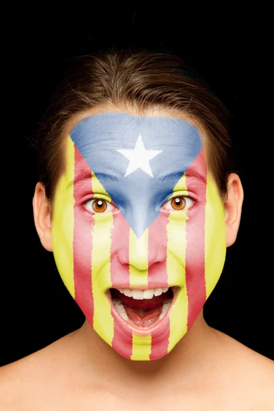 Menina com catalão bandeira pró-independência pintado em seu rosto — Fotografia de Stock