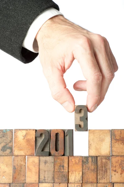 Businessman hand building year 2013 — Stock Photo, Image