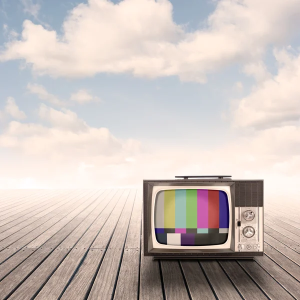 Retro portable television on pier — Stock Photo, Image