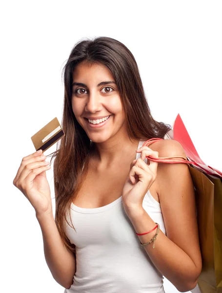 Jeune femme titulaire d'une carte de crédit — Photo