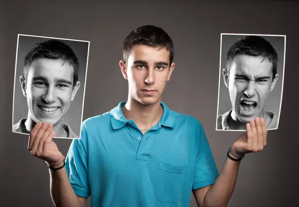 Молодий чоловік з двома обличчями — стокове фото