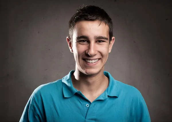 Happy young man smiling — Stock Photo, Image