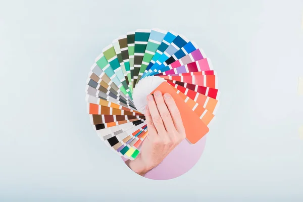 Man Hand Holding Color Guide Palette Blue Background High Quality — Foto Stock