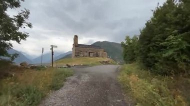 Romanesque hermitage of Sant Quirc de Durro, Vall de Boi. Catalonia, Spain. UNESCO World Heritage Site. High quality 4k footage