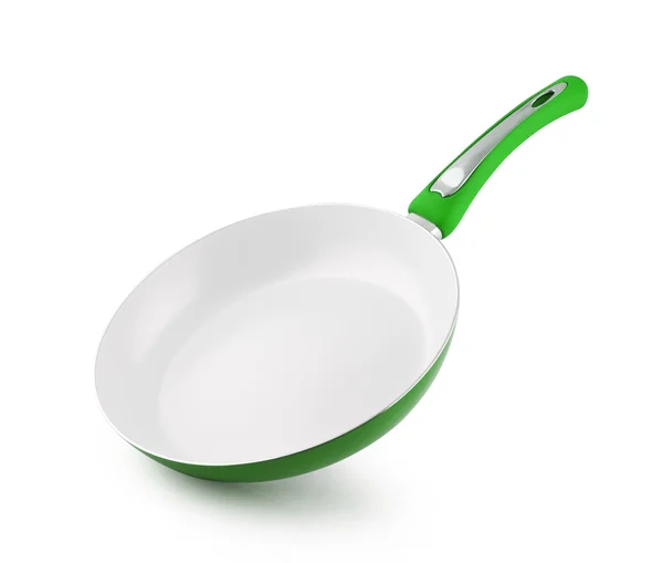 Зеленая сковородка с антипригарным покрытием — стоковое фото